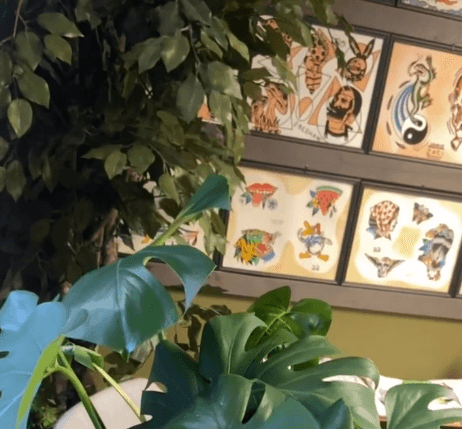 A standing photo portrait of the artist.