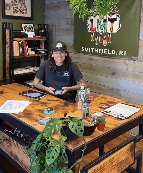 Artist sketching a new tattoo.