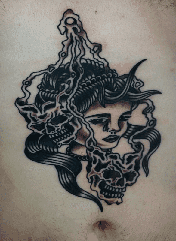 Tattoo of two skulls made of smoke floating around a crying woman's head.