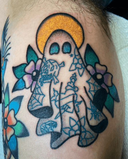 Tattoo of a ghost covered in tattoos.